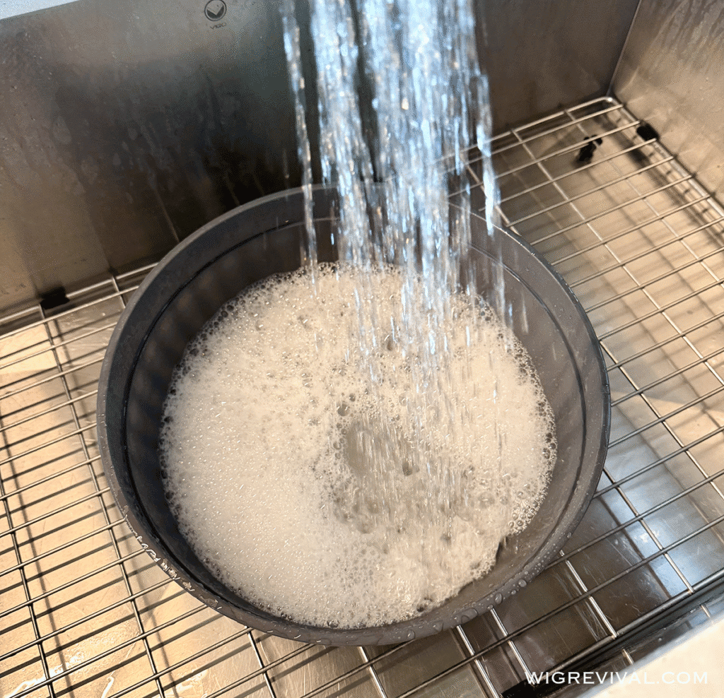 Fill a bowl with water and add shampoo